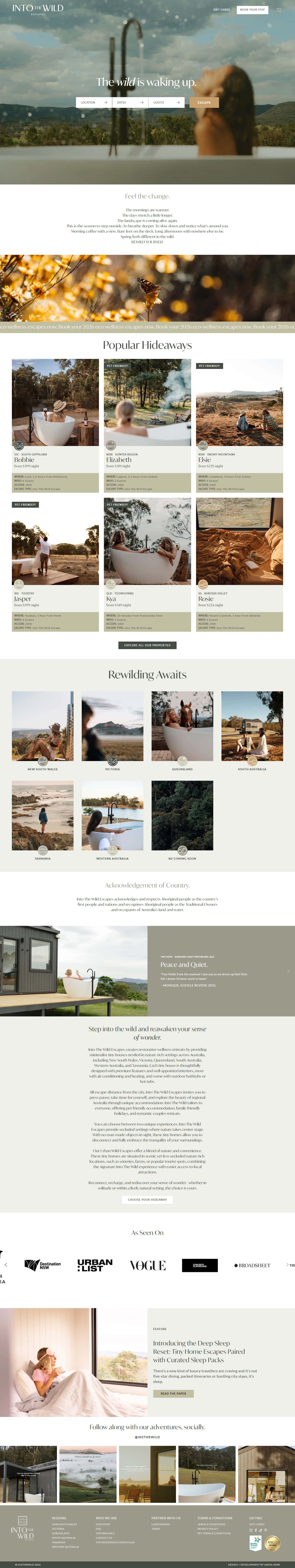 Into The Wild Escapes homepage: full-bleed landscape with an inline availability search